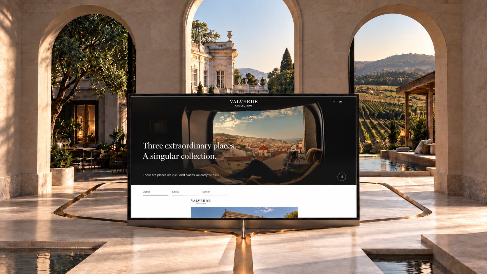 A mockup of the Valverde Collection website on a screen, under three stone arches that open onto a garden terrace, a palace and vineyards, one for each house.